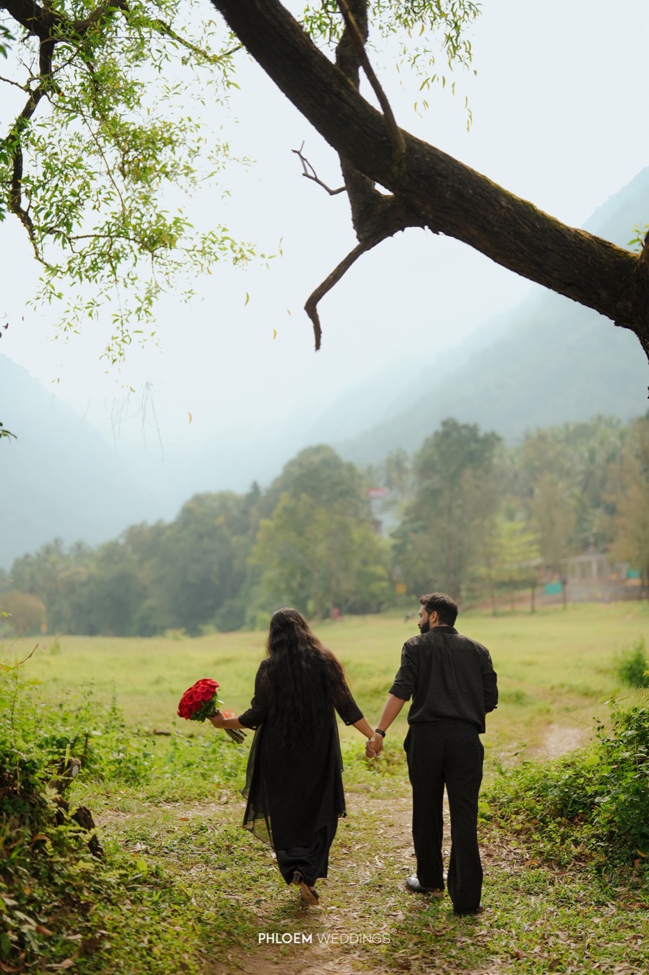 Amal and Angel walking hand in hand